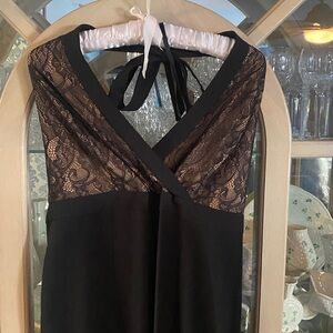 BCBG MAXAZRIA JUMPSUIT Halter top. Lace overlay, slit in center of wide leg pant